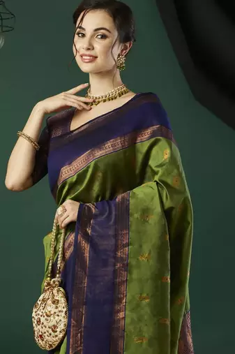 Green silk blend woven saree