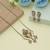 Light pink color lord ganesha american diamond necklace set