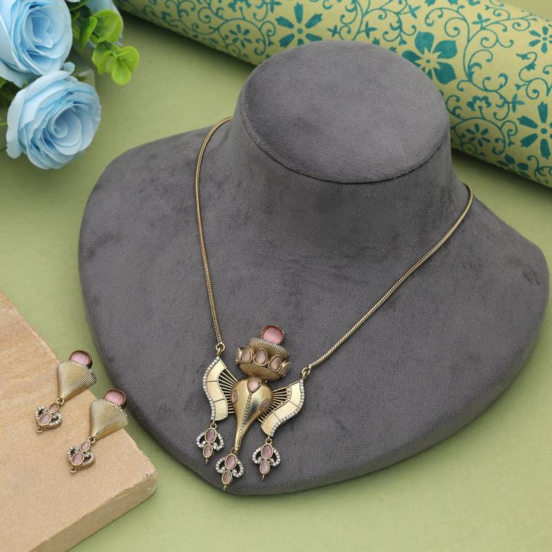 Light pink color lord ganesha american diamond necklace set