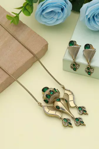 Green color lord ganesha american diamond necklace set