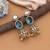 Firozi color american diamond earrings