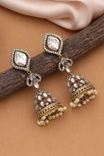 White color american diamond earrings