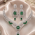 Rhodium finish bottle green diamond necklace set