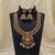 Elegant gold color lord laxmi temple necklace set with traditional ethnic design