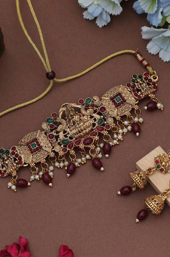 Stylish maroon color choker lord laxmi temple necklace set for festive wear
