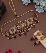Stylish maroon color choker lord laxmi temple necklace set for festive wear