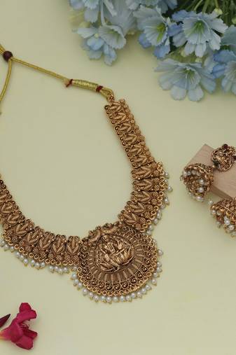 Classic gold color lord laxmi temple necklace set with royal antique finish