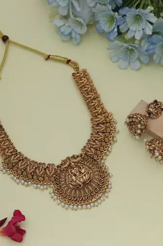Classic gold color lord laxmi temple necklace set with royal antique finish