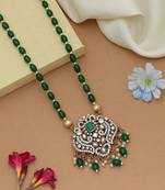 Stylish green color stone necklace with traditional ethnic party wear finish