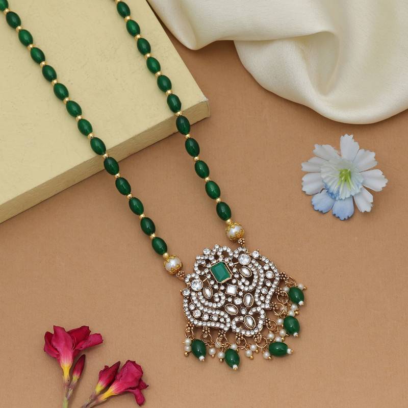 Stylish green color stone necklace with traditional ethnic party wear finish