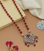 Graceful maroon color stone necklace elegant festive jewelry design collection