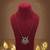 Graceful maroon color stone necklace elegant festive jewelry design collection
