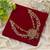 Stylish maroon & green color hair brooch with antique temple inspired artwork