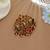 Royal rani & green color temple hair barrette with traditional temple artwork