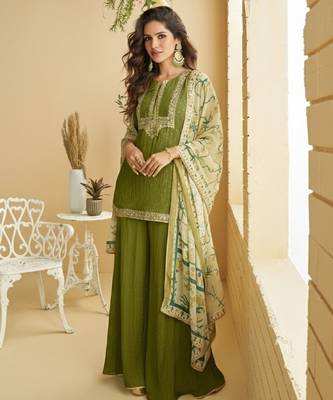 Green silk blend  embroidered sequin salwar suit  1