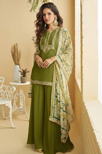 Green silk blend  embroidered sequin salwar suit 