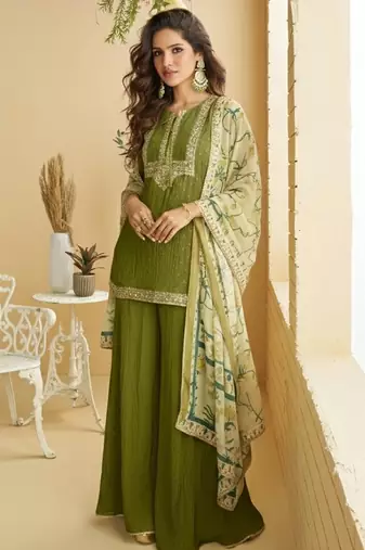 Green silk blend  embroidered sequin salwar suit 