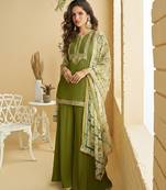 Green silk blend  embroidered sequin salwar suit 