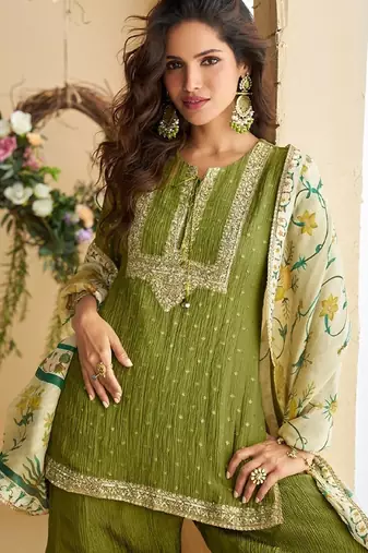 Green silk blend  embroidered sequin salwar suit 