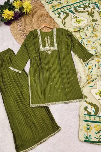 Green silk blend  embroidered sequin salwar suit 