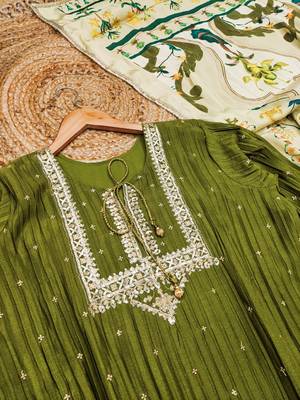 Green silk blend  embroidered sequin salwar suit  4