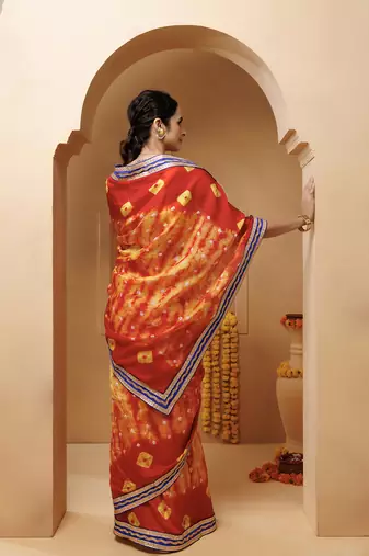 red-yellow handcrafted bandhani pre-stitched silk saree