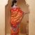 red-yellow handcrafted bandhani pre-stitched silk saree