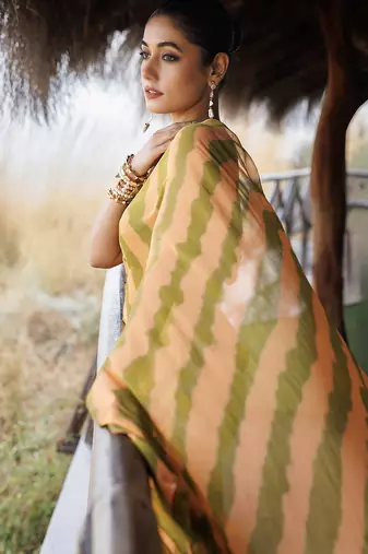 green & orange ruffled pre-stitched leheriya chiffon saree