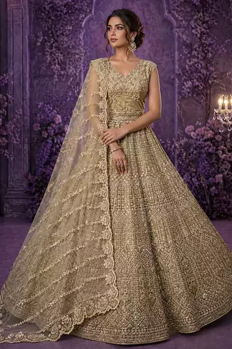 Golden Detailed HandWith Motif HandAnd Crystal Pipe Sequins And Thread Net Lehanga Choli