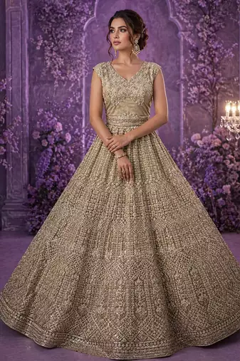 Golden Color Detailed Handwork With Motif Handwork And Crystal Pipe Work,Sequins And Thread Work Net Lehanga Choli