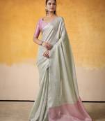 GREEN tissue silk blend saree with contrast border & matching blouse