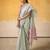 GREEN tissue silk blend saree with contrast border & matching blouse