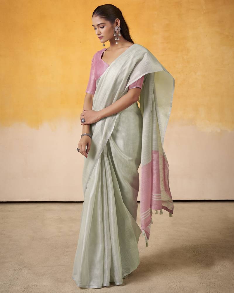 GREEN tissue silk blend saree with contrast border & matching blouse