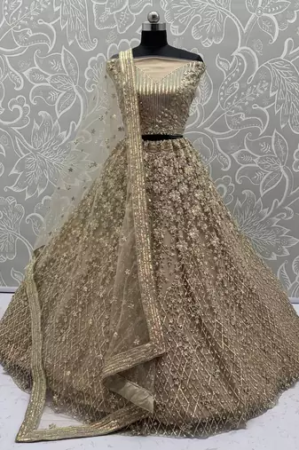 Golden Color Multi Thread Work,Sequence,Zari Embroidery,Zircon Studded All Over Work Net Lehenga Choli