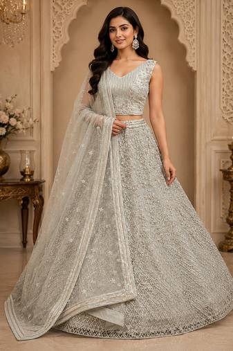 White Multi Thread Sequin Zari Embroidery Zircon Studded Net Lehenga Choli
