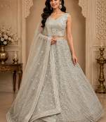 White Multi Thread Sequin Zari Embroidery Zircon Studded Net Lehenga Choli