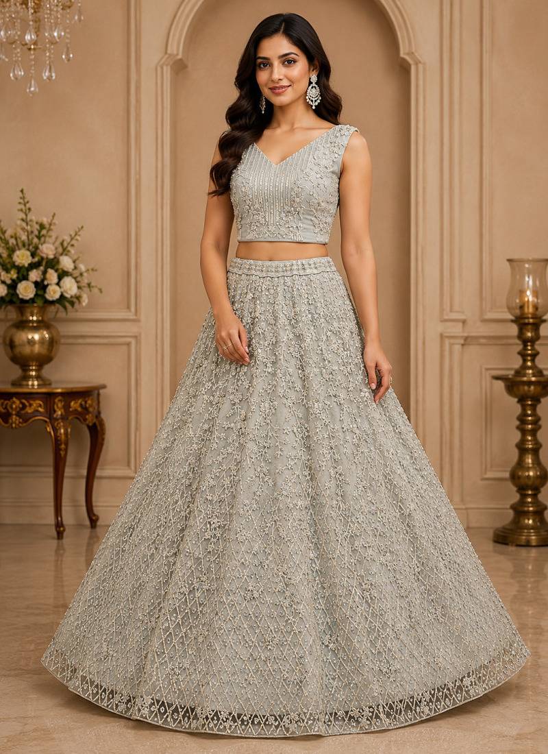 White Multi Thread Sequin Zari Embroidery Zircon Studded Net Lehenga Choli