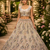 Cream Sequins Flower Pattern Multi Thread Fancy Embroidery Heavy Net Lehenga Choli
