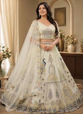 White Color Peacock Pattern Crafted,Dori And Thread Work,Zircon Diamond Studded All Over Work Net Lehenga Choli 1