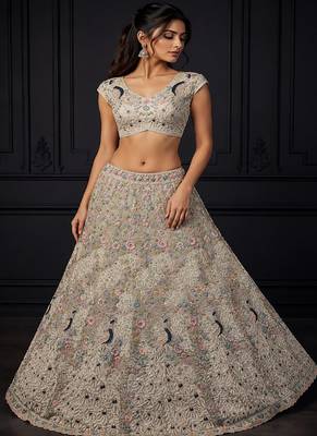 White Color Peacock Pattern Crafted,Dori And Thread Work,Zircon Diamond Studded All Over Work Net Lehenga Choli 2