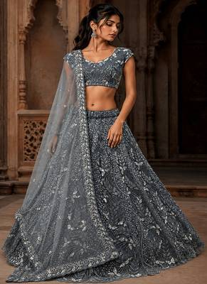 Grey Color Combine Of Dori,Rainbow Sequins,Embedded With Lots Of Zircon Studded All Over Work Heavy Net Lehenga Choli 1