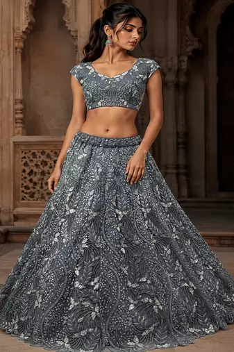 Grey Color Combine Of Dori,Rainbow Sequins,Embedded With Lots Of Zircon Studded All Over Work Heavy Net Lehenga Choli