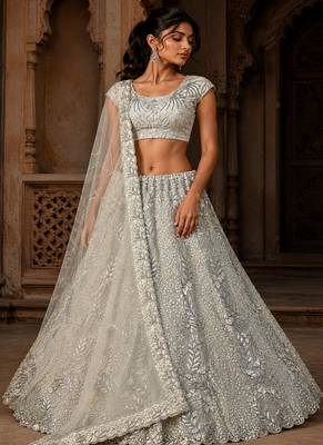 White Color Combine Of Dori,Rainbow Sequins,Embedded With Lots Of Zircon Studded All Over Work Heavy Net Lehenga Choli 1