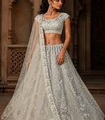 White Sequins Embedded With Studded Heavy Net Lehenga Choli
