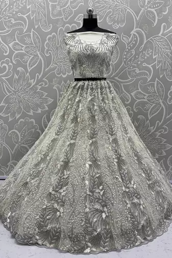 White Color Combine Of Dori,Rainbow Sequins,Embedded With Lots Of Zircon Studded All Over Work Heavy Net Lehenga Choli