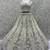 White Sequins Embedded With Studded Heavy Net Lehenga Choli