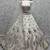 Off White Fancy Embroidery   Peacock Pattern Dori Multi Thread Zircon Net Lehenga Choli