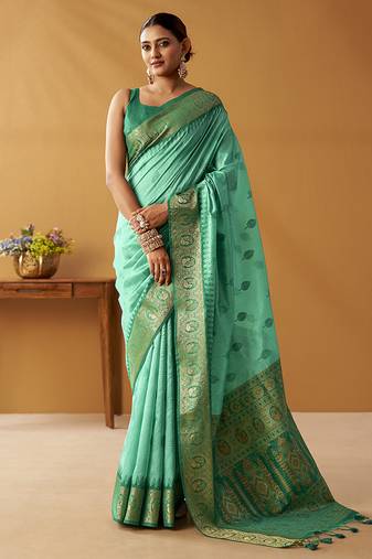 Turquoise silk blend pochampalli border and pallu