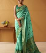 Turquoise silk blend pochampalli border and pallu