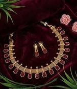 elegant maroon and gold mesh necklace set with matching earrings